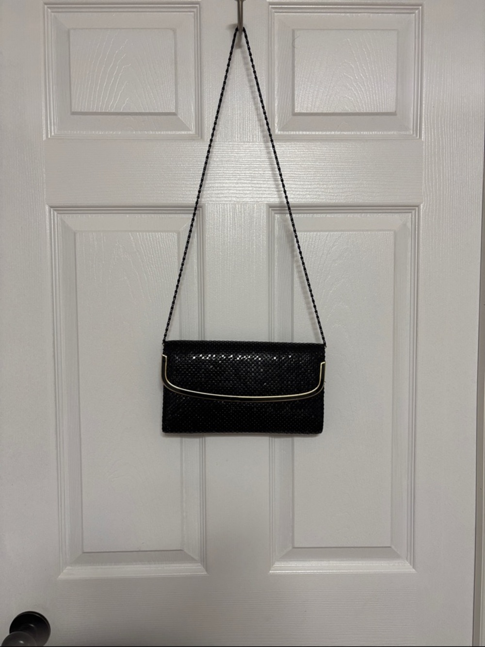 Black Clutch with Gold Trim and chain for shoulder.